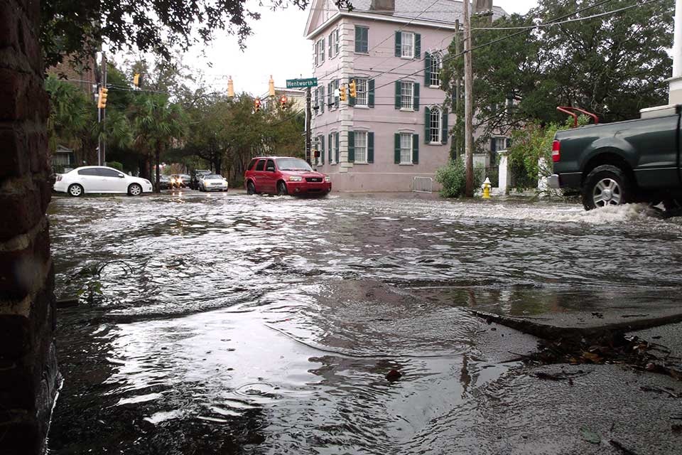 flooded street with cars