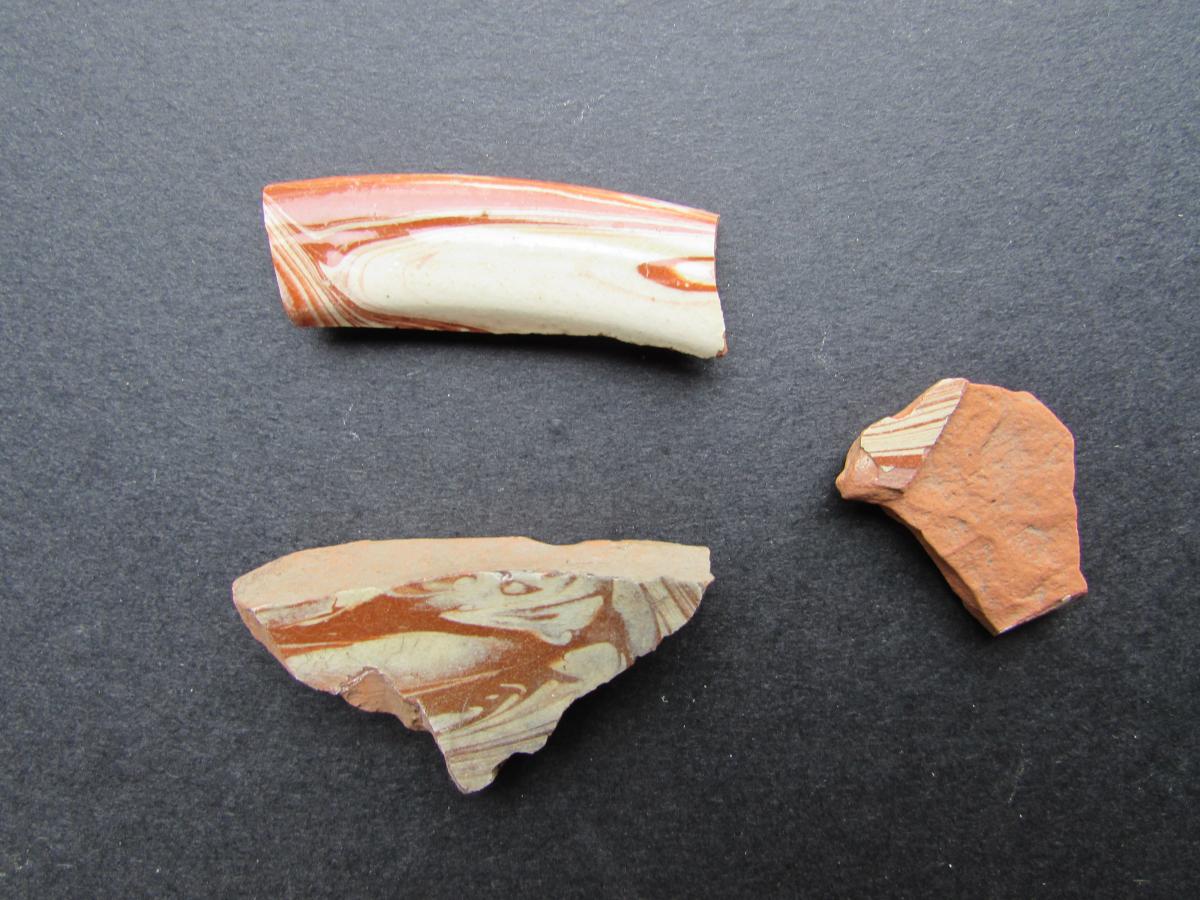 Three sherds of slipware ceramic