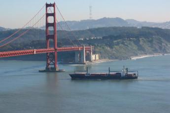 Ship passing under the Golden Gate Bridge