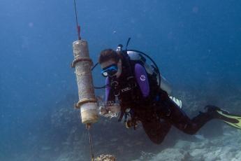 Our team visits a passive acoustic recorder near a coral reef