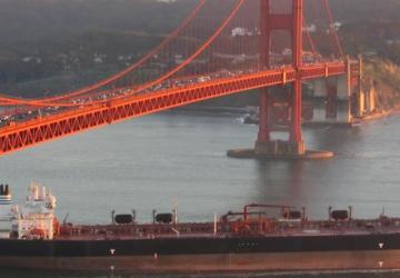 Cargo ship beneath Golden Gate Bridge, San Francisco