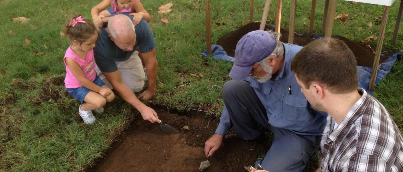 volunteers excavate plot