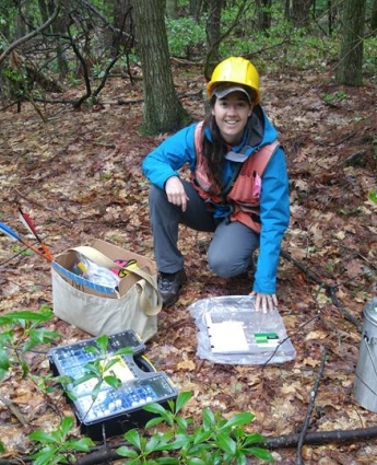 Photo of Jess Shue with leaf sample collecting equipment